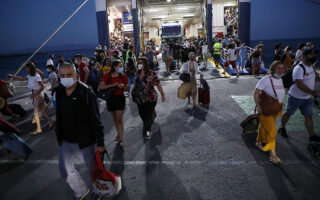 Masks to remain in ferries, taxis, pharmacies
