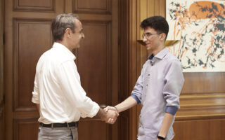 PM Mitsotakis receives Iranian ace student Kouros Baigi at Maximos Mansion