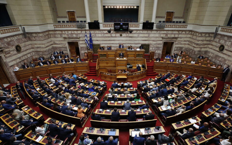 Greek lawmakers debate wiretapping scandal