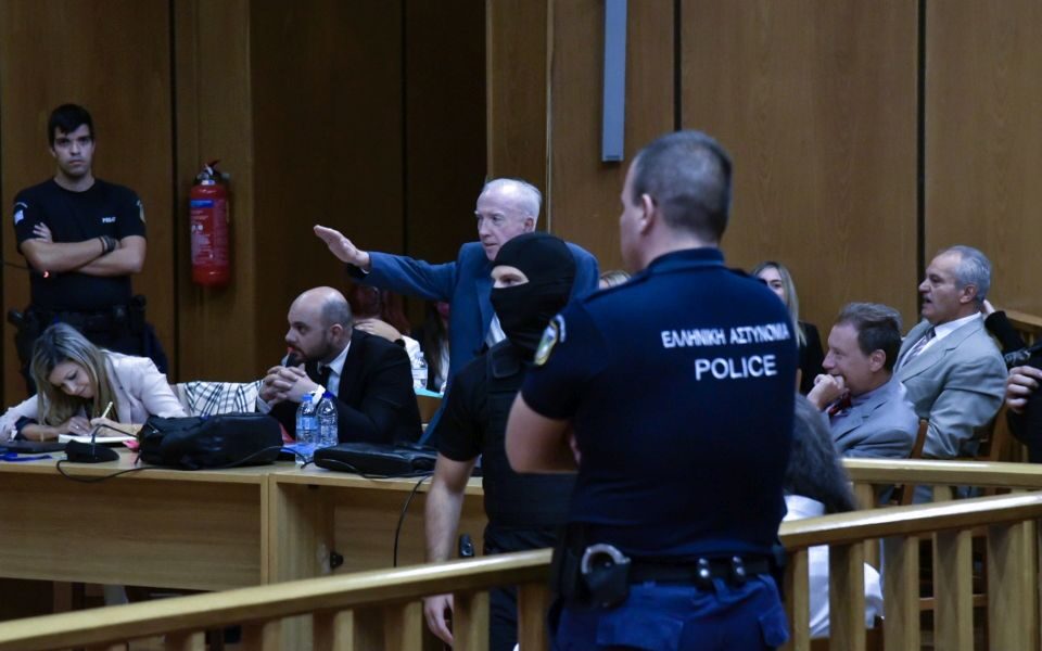 Gov’t minister condemns father’s Nazi salute in court