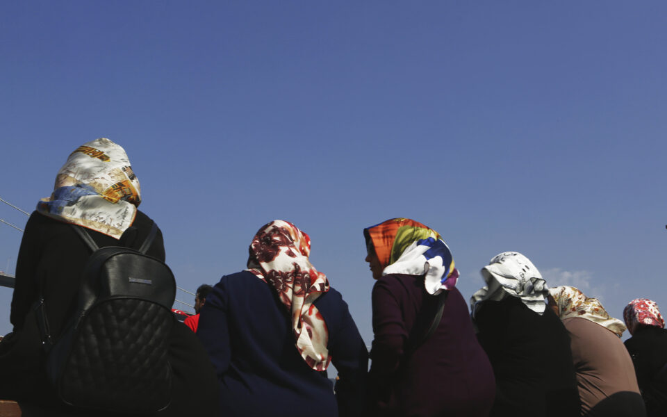 Erdogan says can put Turkey headscarf reform to referendum if needed
