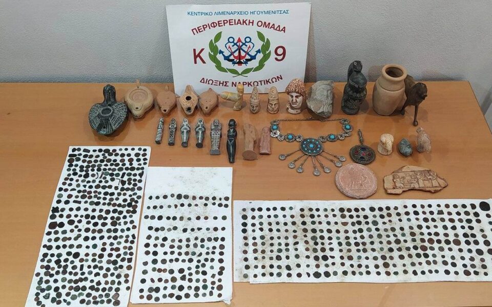 Two people stopped at port carrying dozens of suspect artifacts