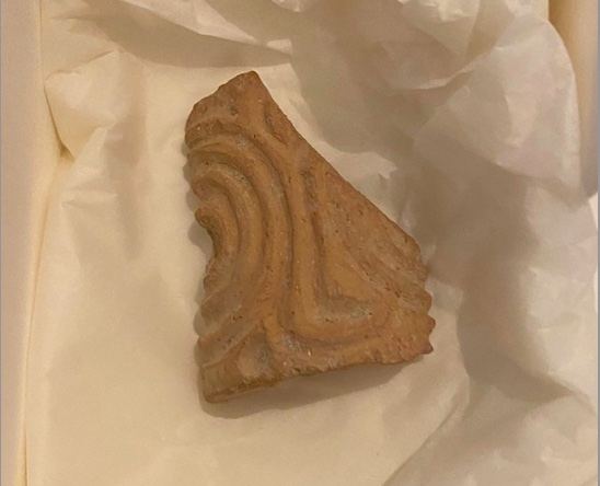 Ancient seal fragment returns home from Sweden