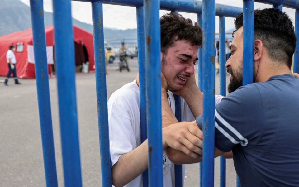Emotional reunion amid despair as Greece searches for shipwreck survivors