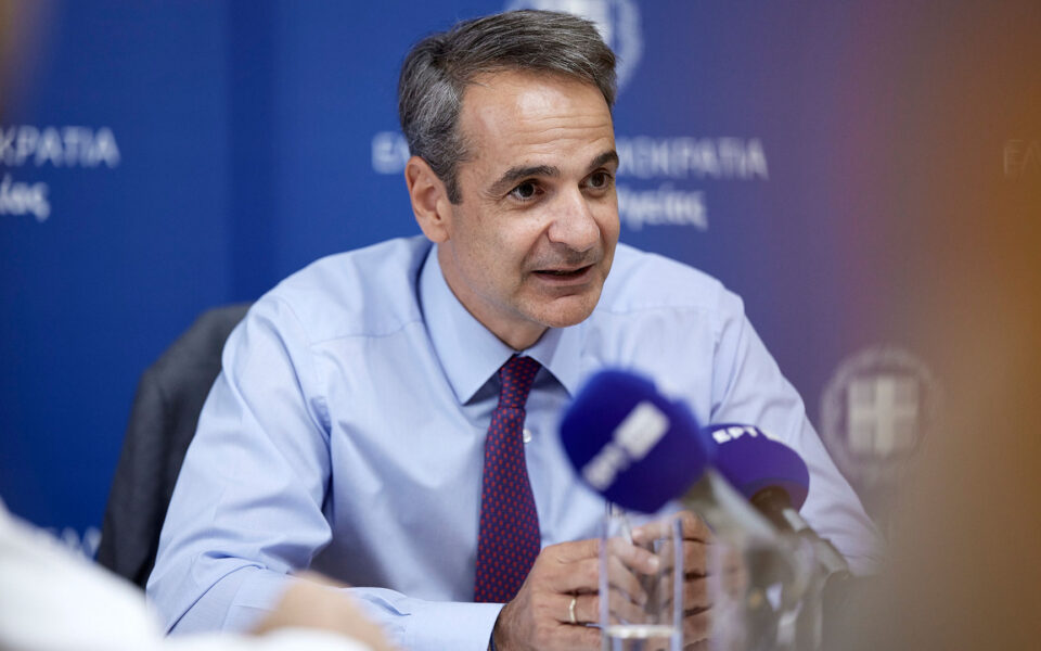 Mitsotakis vows to repay bailout loans early