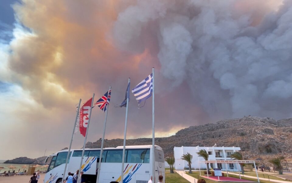 Tourists evacuated in Rhodes as huge fire front expands