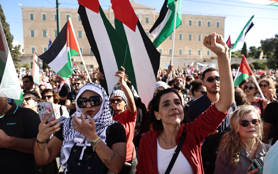 Palestinian ambassador greets crowds during solidarity rally in Athens