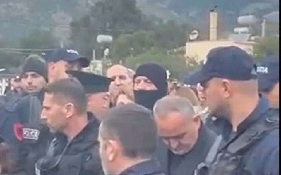 Tension at funeral as ethnic-Greek mayor elect’s appearance cut short