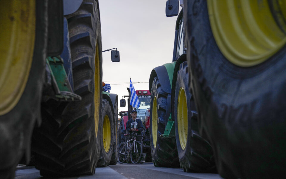 ‘Without us, you don’t eat’: Greek farmers drive tractors to parliament to demand financial help