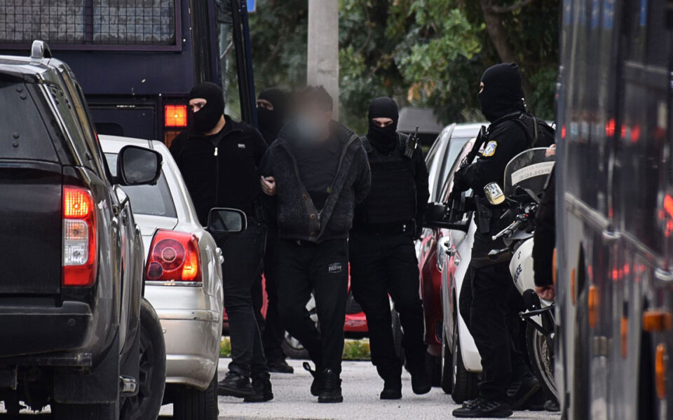 Greek court charges 10 people over bomb and hand grenade attacks
