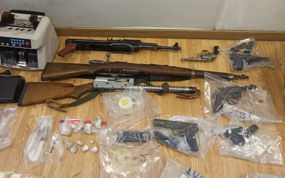 Apartment raid finds drug lacing lab, firearms