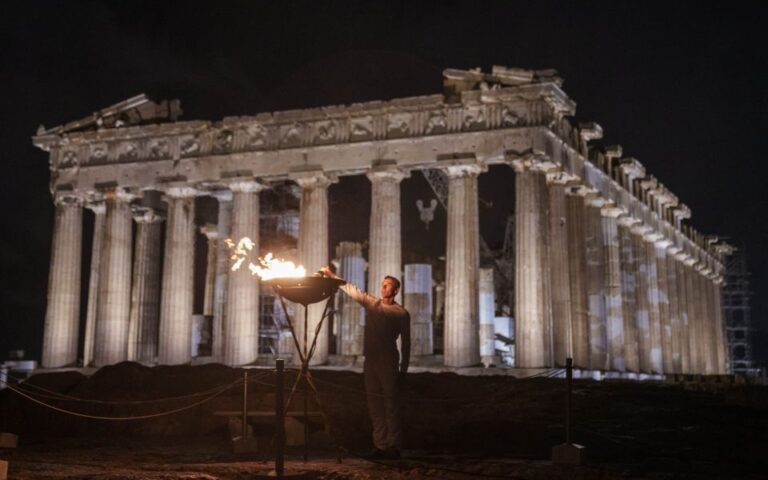 Olympic torch makes Acropolis overnight stop a week before handover to Paris organizers