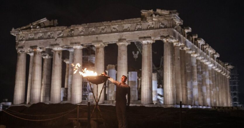 Olympic torch makes Acropolis overnight stop a week before handover to Paris organizers