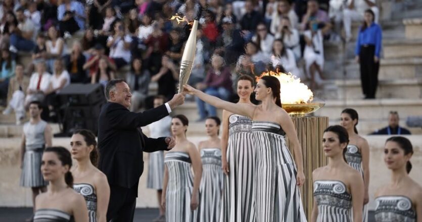 Paris organizers receive Olympic flame in Athens ahead of relay
