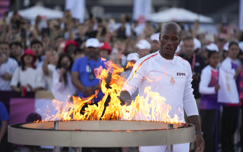 Torchbearers in Marseille kick off the Olympic flame’s journey across France